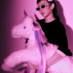Queen Wei Instagram - Me and my unicorn. - 🦄🩷🎀⭐️ - 曾經好幾次夢到獨角獸這樣的生物無所不在的出現在我身邊，總是想像著在我肉眼無法看見的維度，他存在。 他可能真的在。 ／ 📷 @tzuyin1006 #gentlemonster #jenniexgentlemonster #🕶️ #🦄