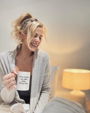 Rachael Carpani Instagram - Thankyou for all the kind messages ❤️
I’ll admit I haven’t had the flu or tonsillitis in a decade ….but both at the same time have really knocked me on my butt🫠🫠🫠
*
But Day 4 , fever down and I’m on the mend! ❤️‍🩹…and the realisation that I have the perfect mug for the days I lost my voice 😎
*
And no I did not allow any pics from days 1-3 🥴
They looked like outtakes from a 90’s zombie movie….even my ego couldn’t take that🥴🧟‍♀️😅