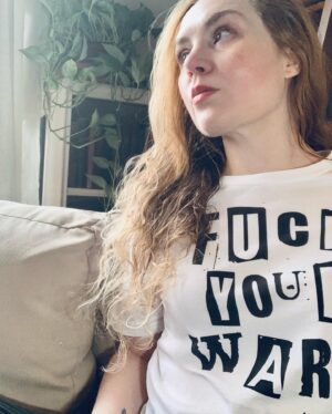 Rachel Miner Instagram - There's no limit to the good we can do 👉 bit.ly/LoWUkraine

Also today I'm wearing the less polite one, because ...well mood (I do LOVE having yet another way to help though lowfshop.com) @legacyofwarfoundation