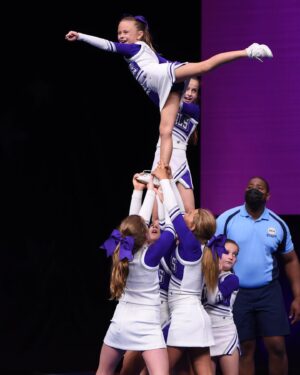 Rachel Reynolds Instagram - So proud of this girl and her teammates performing on a national stage!  They were fantastic!!! 💜🤍 #geauxbengals