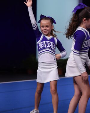 Rachel Reynolds Instagram - So proud of this girl and her teammates performing on a national stage!  They were fantastic!!! 💜🤍 #geauxbengals