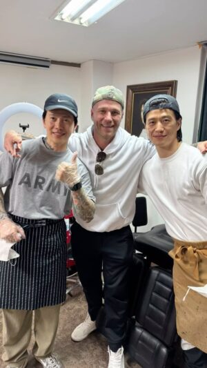 Rachel Van Dyken Instagram - @d_tattoo_studio hooked us up! @natevandyken got a great shot with some of our awesome artists who spent hours immersed in our chaos 😂 #tattos #readertrip #welcometoseoul #seoulkoreatrip #filming #docuseries #rachelvandyken