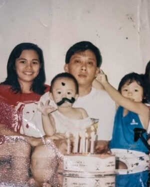 Rachel Wan Instagram - Been exactly 2 years since I lost my dad. I found this old photo and laughed. It’s so representative of my childhood. My parents used to say I was a “rascal” and I used to draw on my brother’s face on any photo I could find. Mind you, we didn’t have digital copies of our photos back then. 😂😈 I’m sorry brother, but you did used to block the TV on purpose when I was watching Powerpuff Girls. 😂