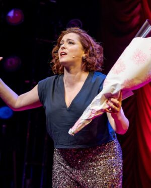 Rachel Bloom Instagram - We opened #deathletmedomyshow the other night and it was surreal. Thanks to @mikeandcarleeprods for making my dreams come true, @williamsburgpizza and @brookiescookiesnyc for the food and @pattilupone for giving us the best step-and-repeat photo of all time. 

Hair: @creightonbowman 
Makeup: @lisahoughton 
Styling: @arieltunnell 

Dress: @aliceandolivia 
Shoes: @larroude
Jewelry: @nickhorey
Clutch: @simitri.shop