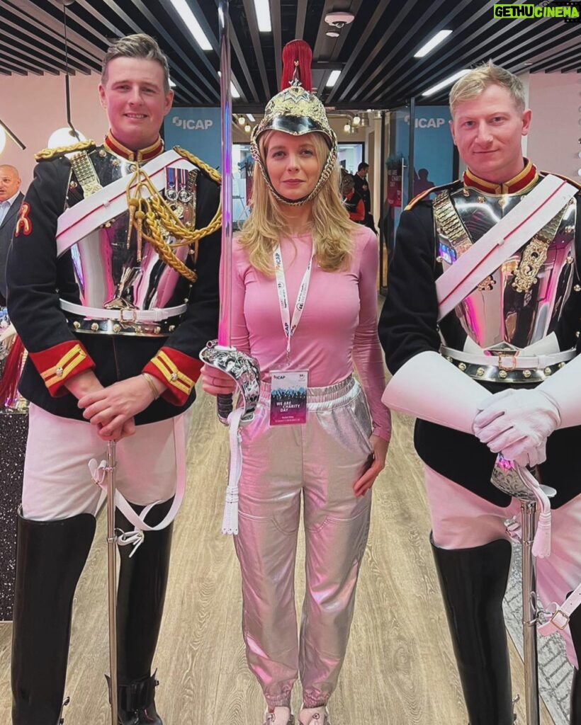 Rachel Riley Instagram - Big thanks to everyone at @icapcharityday for picking @alzheimersresearchuk as one of the charities benefitting from your day of fancy dress madness fundraising today! Apologies to these brilliant servicemen who I thought had just gone and got really good costumes and so asked to borrow the sword and helmet for a pic 🙈🤣 now I look back at Spencer, the Toy Story soldier taking me round last year, the quality of their look is rather different… Thanks for looking after me this year Peaky Blinder Dom, and to the many traders who let me “help” on their desks/phones to raise money. ARUK are hoping to find a cure for dementia in our lifetimes and I’m so pleased they were chosen again to be supported by ICAP today. #charity #ICAP #alzheimersresearchuk #aruk #fancydress
