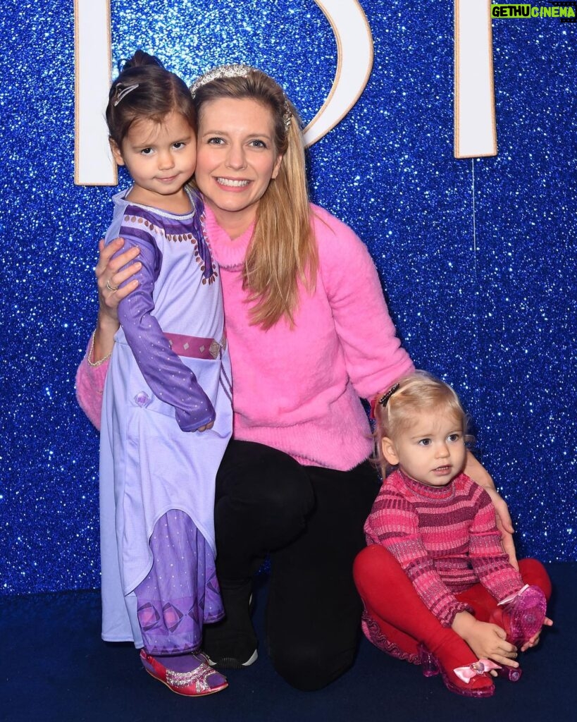 Rachel Riley Instagram - Hola! Shalom! Salaam! - one of the first lines in the gorgeous new Disney movie - Wish 🌟 Took the girls for their first ever trip to the cinema and what a lovely experience it was. The film is a new instant classic in my book, enjoyed the girls sitting on my lap during the scary bits, wagging their fingers saying, “naughty, naughty King” 😂 I’m glad we’re in the Disney age with them now, can’t wait till they’re old enough for the parks. We enjoyed the Disney 100 exhibition together a few weeks back too, although I probably would have enjoyed it more without them and actually being able to listen to and read the displays (sorry girls!). Thanks too for the purple Asha costume that was #gifted to Mave, lots of little girls will enjoy dressing up as her for years to come I’m sure. #premiere #wish #disney #asha #disney100
