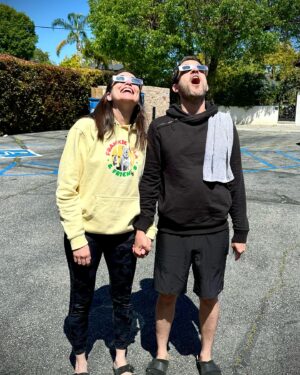 Rena Sofer Instagram - Me and my love @sbookstaver safely looking at the #solareclipse today! It was extraordinary!!! The look on my face is exactly what it would be if all the shelters had to close down because all dogs/ animals had safe and loving homes!! Sorry if you don’t know me well enough to know that I ALWAYS will bring the subject, any subject, back to dogs!!! #adoptdontshop #safety first!! @lisachiarelli