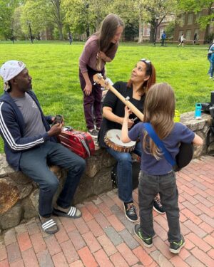 Rhiannon Giddens Instagram - When Justin, Dom and I started going down to play with Joe Thompson we had no idea what was starting- but every year that passes I’m more and more grateful to have been part of an apprenticeship that connects me to generations of music makers from my community. It wasn’t just the tunes we learned from Joe, it was his stories, his vibe, and the way he related to this music. Now we feel it’s important to create moments where we sit and play his tunes and tell our stories of playing with him- it’s not about money, it’s not about the exact notes, it’s about passing on what we learned from him.

Justin and I had our very first Joe Jam a couple of days ago on the wall in front of Wilson library on the campus of Chapel Hill as a finish to my residency there, and it will hopefully be the first of many. ❤️❤️❤️

Photo by Megan Frestedt
