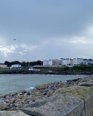 Roan Curtis Instagram - Sorry, sappy post incoming. Today I went and visited the town that my dad’s side of the family is from, Dun Laoghaire. My dad had given me a list of places to visit and the first on my list was the East Pier where my Mise (grandmother) used to go walking often. It was absolutely pissing rain and then as soon as I stepped out onto the pier, the clouds parted and this rainbow appeared. It felt like my passed relatives saying hello and welcome. It made me cry happy tears. Today I’ve visited the church where my grandparents got married, the house my Mise grew up in, the house my grandfather owned, and now I’m sitting in a pub that used to be his childhood home having a Guinness. I’ve never felt so close to my heritage and those who have come before me. I feel so lucky to be here, it’s so magical.