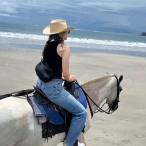 Roan Curtis Instagram - You’ve seen some gorgeous Costa Rican scenery but have you seen me looking like your saucy aunt while drinking a cosmo (they’re coming back I can feel it in my bones), two horses, a dog, an attempt to wash my face, me ill-advisedly riding an atv, and my barking rendition of that one Lincoln park song after a few margaritas?