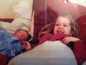 Roan Curtis Instagram - happy birthday to the best sister a girl could ask for, @rucurtis ❤️ i am still just as enthusiastic about your existence as i was in the this first photo (where you look like a sleeping angel and I look like a chaos demon with sharp little teeth and no eyebrows). thank you for always telling me when my outfit is ugly. you keep me young (and humble).