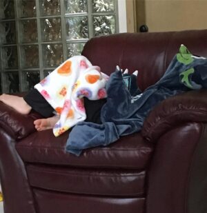 Robyn Brown Instagram - Look very closely and you may just see a Soly boy under that dragon blanket.... 😊😘. #ilovebeingamommy #itishisfavoritetobeadragon #handsomepants