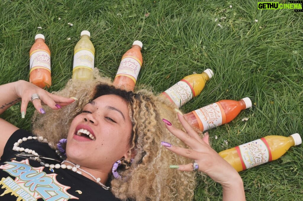 Ruby Barker Instagram - Competition time for a free hamper! Follow @burzt_drinks tag three friends in the comments section & put this post on your story 🥳 @burzt_drinks is Jamaican alcoholic and non alcoholic rum punches, my absolute favourite 🤩 #rum #competition #cocktail #rayandnephews #competitiontime