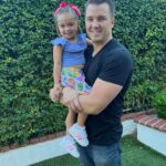 Sabrina Bryan Instagram - Monroe’s First Day of Preschool! 💖 This little one amazes me with how brave she is to “strut” right into new experiences…all while Mommy is having a slight melt down and having to be pulled away from the door by Dad 😭🤣 although I can’t wrap my head around the fact that we are already here…we are SO happy that our baby girl loves her teacher and is sooooo excited to go to school!! ❤️🍎 #latermom #firstdayofschool #minimomheartattack #dontworry #momsdoingok