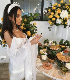 Sahar Golestani Instagram - I had the most ✨magical✨ italian themed bridal shower 🍋. I was really showered with love, I’m so lucky to have such wonderful friends 💙💛 4 more days till the big day! 
.
.
 Special thanks to @itssabzi my little hostess and visionary. @officialavamae for the most beautiful backdrop and @rimafakih for helping bringing it all to life 💛 also still drooling over my caviar table 🤤