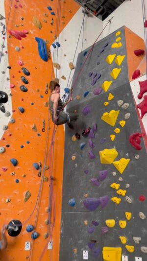 Sandra Mae Frank Instagram - Doing stunts today for #TheSilentHour has me looking back to this moment; training for #NewAmsterdam, so here’s a throwback video of “cute-cute” rock climbing for #DamFam 😎💙

I love being active, and it’s good for the soul. 

#RockClimbing #Repelling #Action


Sandra Mae, a white woman in a green yoga outfit with pink shoes, repelling on a rock climbing wall with colorful rocks.