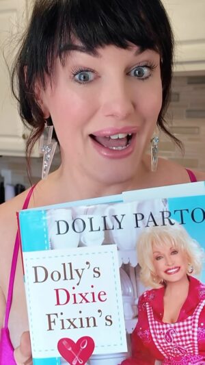 Sara Andrews Instagram - Dolly & the Doll: Corn Pone 

(Not my poor nose being dry as hell & that close to the camera 😂) 

#southernfood #countrycooking #dollyparton