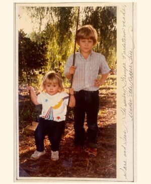 Sara Watkins Instagram - When I stopped in to give my aunt Joanie a CD last week she gasped at the title and said, “Oh my stars! Is it called Under the Pepper Tree?” Later that day she sent me this picture of my brother and me. We’ve had two family reunions and countless birthday celebrations under this tree. We’ve camped under it, I have admired it my whole life, and I’m happy to say it still stands in what is now Joanie’s backyard. The description she wrote way back then made us all smile.  

#UnderThePepperTree has been out for one week! I’ve been amazed at the response thus far. Thanks to everyone who’s listened.