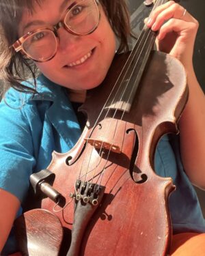Sara Watkins Instagram - A few days ago I noticed my violin sounded strange and found an enormous crack leading down from the F hole to the base of my instrument.  Terrible feeling. So Fortunately for me, @jeffpicker recommended I call @KCstrings in Kansas City and they fixed me RIGHT up. Anton met me on a Monday and he and Aiden fixed my fiddle up beautifully!! It sounds like it’s old self again, pre-crack.  And they even let me borrow one of their beautifully made Krutz violins. THANK YOU FOR SAVING ME IN TOUR @k.c.strings!