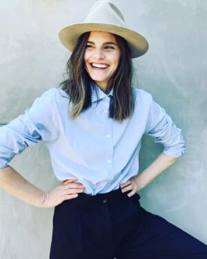 Sara Gilbert Instagram - me saying “look! i’m wearing a hat! and also! hi! do you like wanna come to the last night of my residency at @thehotelcafe monday 8/29 @ 7pm. it’s gonna be something… @reallindaperry @thesaragilbert @andrewleeds @rachelgould27  link for tickets in my bio! oh! and special guests @iamtimbagley @noahweisberg  @karoline_menezes__ @dereksteincello and more!!! 📸 @amandademme  love, me