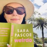 Sara Pascoe Instagram - 😵‍💫🤪🥹😬🤡WEIRDO is finally out today! 📕 An UTTERLY EXCELLENT, FUNNY novel by my beloved fellow weirdo @sara.pascoe - seen here in pic #2 dressed as a poem, while she waits for me, dressed as a detective, to have a little vomit into a bin on a night out.* Please buy this book, you’ll adore it, just like I did when I got a special early copy. I laughed, cried & wished the adventure with the lead character would never end. Also if you buy it, she’ll use to profits to feed my godson who she kindly gave birth to for me. *bin photo by @steenrasko who thought it would be good to capture this moment for history/ national geographic. #aislingsbookclub