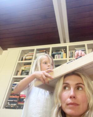 Sarah Carter Instagram - Peace and love from my living room…

Lately, I have felt like the world I see here on IG is not the world I want to perpetuate.  There is light and love everywhere I look as much as there is darkness and disgrace. The block set we are playing with in these photos is called “women who dared”… dared to rebel for love, speak truth, share wisdom, and new ways.

My gorgeous white wolf-like-creature commonly referred to as a dog is so calm in these photos and yet she digs up the garden, escapes, causes upheaval in the community and like any child she inconveniently demands attention, but she is a part of us and lives for these lazy hours of nothingness and togetherness. 

So excited to learn that in the 6th grade I played Dorothy in The Wizard of Oz, Alice wanted to dress up as Dorthy and “practice” to send my school friends from Winnipeg a karaoke video.  Her purity and the song itself brought me to tears as I realized how formative and prevalent Somewhere Over the Rainbow remains to my spirit. 

I now host women’s circles and have for two decades to bring us in closer touch with our creative and healing natures… home to ourselves.  The learning is age old to face our own darkness to find our way through to self-realization/freedom, but also that we are not meant to be alone.  Our unique paths and gifts are essential to the whole. We are designed to find beauty in our pain by sharing.

I hope this post inspires your own softeness and slowness this weekend… to remind yourself that you can find your way back home.

In the YouTube lineup after the kareoke video, a post of my now husband Kevin and I singing together randomly popped up. I hadn’t seen it since before Alice was born and needed to… to be reminded of the original bond between us that has bore so much fruit in spite of incredible challenges and heartbreaks… the song, too, is about mother love… unconditional love… where we come from before the confusion… a return home.

And finally, an exercise I offered to the women in my circle last week: Write yourself a letter of encouragement from your Dreamer. We all need to feel less lost. What if you were right where you belong? Give yourself some recognition.