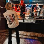 Sarah Beeny Instagram - Soundcheck before another sold out gig. Next stop @mrwolfsbristol this Thursday, there are only a few tickets left so don’t miss out! Link for Thursday and rest of the tour tix in @the_entitled_sons bio - Don’t say I didn’t warn you X
