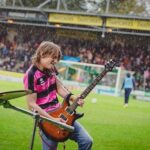 Sarah Beeny Instagram - @the_entitled_sons on fire despite the rain @ytfcofficial yesterday at half time - so proud of #glover for winning 2-0 AND raising rest of money needed for @yeovil_hospital_nhs @yeovilhospitalcharity new breast cancer unit x