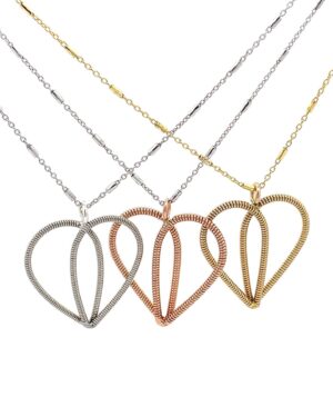 Sarah McLachlan Instagram - These beautiful Heart Necklaces are designed by @heartstringsjewelry.ca using my previously played guitar strings.  Proceeds will be donated to @sarahschoolofmusic which provides music instruction at no cost to children and youth facing barriers to access. XoS