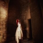 Sasha Alsberg Instagram - The princess in the tower…a love story or a life sentence? 🖤 #cuedramaticmusic • • • I am in absolute awe with how these photos turned out. Stephen and Sara from @manorandmaker truly captured the vision! See that stunning layered skirt? Well, Sara made it in about 2 minutes with just pins holding it together. Just wow! #OfWhimsicalMoments #everydaymagic #TheHappyNow #chateaucore #quietinthewild #redhead #france #southoffrance #frenchcountryside #historicaldress #periodfashion #cottagecore #littlewanderersdiary #folkandstory #booknymph #bookstagram #authorsofinstagram #writingretreat #frenchchateau #medevielfashion