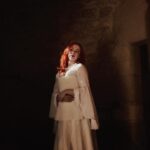 Sasha Alsberg Instagram - The princess in the tower…a love story or a life sentence? 🖤 #cuedramaticmusic • • • I am in absolute awe with how these photos turned out. Stephen and Sara from @manorandmaker truly captured the vision! See that stunning layered skirt? Well, Sara made it in about 2 minutes with just pins holding it together. Just wow! #OfWhimsicalMoments #everydaymagic #TheHappyNow #chateaucore #quietinthewild #redhead #france #southoffrance #frenchcountryside #historicaldress #periodfashion #cottagecore #littlewanderersdiary #folkandstory #booknymph #bookstagram #authorsofinstagram #writingretreat #frenchchateau #medevielfashion