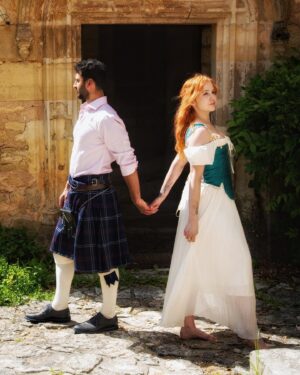 Sasha Alsberg Instagram - We cosplayed Klara & Callum in preparation for Fracturing Fate (the sequel to Breaking Time) at the wonderful @manorandmaker in France this week! ✨ 

☁️ dreams do come true (thanks to @manorandmaker) ☁️

Fracturing Fate comes out August 15th and I cannot WAIT for you all to see where their journey continues (or ends 🫢) 💕

@manorandmaker have retreats just like this one for all to enjoy! Check out their website for more information!

👗 by the amazing Sara from @manorandmaker 
🏴󠁧󠁢󠁳󠁣󠁴󠁿 kilt (borrowed) from @cre8vman
🕺 @gordonjuice 
📷 by @cre8vman
📖 by me 😊
👩🏻‍🦰 by @halohairextensions 

#France #dordogne #manorandmaker #creativeretreat #visitfrance #chateaulife #summerholiday #cottagecore #projectred #fracturingfate #breakingtime #scotland #meninkilts #romancenovel #yafantasy