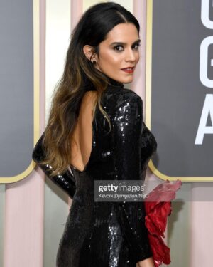 Sepideh Moafi Instagram - Last night the @appletvplus Black Bird family reunited to celebrate our Golden Globe nomination for best limited series, as well best performance nomination for @taron.egerton & a win for @paulwhausergram, one of the most humble, talented & deserving people on this planet. I looked around our massively talented table. I look a few tables over & I see Steven Spielberg & Angela Basset & so many others I’ve grown up admiring. How did this happen? These moments of celebration come after years and years of hard work & never giving up through life & career challenges, sure, but I never fool myself into thinking I’m more special than anyone else out there who’s just as hard working & talented & perseveres no matter what. I often ask myself, why me?
So many of my parents’ closest friends and family were murdered by the Islamic Republic. In 1984 my parents were forced to flee Iran. They spent years with my sister moving from refugee camp to refugee camp all over Turkey & Germany. I was born in one of those camps in Germany. We were finally able to come to the U.S. & build a home that resembled home, but never fully felt like home. 

Moments where I feel undeserving or ask why me I hear my mothers voice: “don’t ask why, just say thank you.”

Please look at the last slides for the story behind the dress. 
🙏🏽✨

Art is resistance & resistance is Art. 

TEAM 🙏🏽❤️‍🔥

👗 @amirtaghicollection 
🎨 @hausofmilad 
💇🏽‍♀️ @rena.calhoun 
💄 @danadelaney 
👠 @jimmychoo 
💍 @rahaminovdiamonds 
💎 @neillane 
💆🏽‍♀️ @kikiyurskin @detoxbyrebecca 
💅🏼 @sima.nail.artist 
Styling @kevinmichaelericson 
All 📸 via @gettyimages 
🙏🏽 @goldenglobes 
🙏🏽🌹 to @amandajpel @rscapellan & @teamid