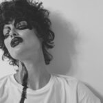 Shalom Harlow Instagram - 🖤🖤AGOLDE🖤🖤 Often people don’t see my heart. They feel it, but they confuse the attraction and complicate it with a projection of desire They’ll say, “oh your eyes are so pretty” Meaning, “I’m responding to an aesthetic pleasure that your symmetry and angles present for me” But what they really mean, even when they don’t know it themselves is “Your eyes are beautiful because there’s a radiance there. There’s a quality of purity and power that comes from knowing your own capacity for both outrage and tender abiding” This clarity of knowing comes from continually pointing that accusing, outwardly extending finger and pivoting it back towards oneself But what if one does that to a fault? What if our rotational access was set in a faulty factory setting by those who benefited in their own outward blame How do I learn where you end and I begin when a sense of center was never cultivated I was pruned to shape around your cold and determined will. I was shackled to your scarce expressions of love Oh father, it has finally begun, I am learning to bend towards my own sun @agolde 📸 @guineverevanseenus Styling @alexisasquith Makeup @kuma1206 Hair @hairjordon @julianniznik @imgmodels