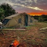 Shannon Elizabeth Instagram - Camping next to @munutherhino in his new sanctuary. Lots of rain yesterday, but tonight was a stunning sunset. Tomorrow's another day of long, hot work ahead. So much to do here, but we're loving every minute of it!! #munutherhino #shannonelizabethfdn #oztent #campingwithdogs #love