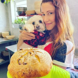 Shannon Elizabeth Instagram - Peanut & I baked sourdough bread recently, & you can see he's so proud of himself! I'm getting ready to travel again for the @shannonelizabethfdn & acting, & I'm missing him already. But he says he understands that I'm working to help animals like him that need a louder voice. We'll never stop fighting for the animals!! 

#animals
#voiceforthevoiceless 
#conservation
#shannonelizabethfoundation
#dogs