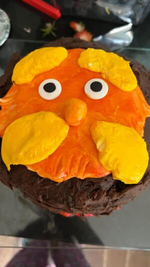 Shappi Khorsandi Instagram - HAPPY JUNE BIRTHDAY SEASON!!!! I thought they were at cricket practice...this was rushed!!!! They came home early! DOES IT LOOK LIKE THE LORAX???? I am not an artist 😅😅😅😅😂 #thelorax #birthdaygirl #loneparent #baking #glutenfree