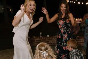 Shelby Wulfert Instagram - and this big, beautiful family I am so blessed to be part of 🥰 

The love that my mother & father in law have for each other has grown into the big love we all share. I’m so happy to have sisters like I’ve wished for since I was a little girl & treasure my moments with each of them and their wild bunches 💛

Becoming an auntie to these kids has been one of my greatest joys in life so far. And having lost my own grandparents, it’s been incredibly special to get to be a granddaughter again. When we first called Mammaw to let her know we were engaged, she said in her sweet as Texas tea accent, “well it’s about time Lucas! Shelby, I’ve always thought of you as my granddaughter but I’m glad we’re making it official.” 😭 

It was so special to share this day with all of you. From watching the littles color while I was getting my hair & make up done, to my hook and eye coming off my dress and having my mama & mama in law sew a new one on for me. Oh, and forgot to mention our night was interrupted by a few copperhead snakes which were swiftly remedied by my father in law’s cowboy boots and pocket knife 🐍🫣 #texasyall

Photographer: @natalienicolephoto 
Venue: @chateauhiddenwood 
Hair: @meghanmcnameebeautydtx 
Make Up: @ashleymariedoesmakeup