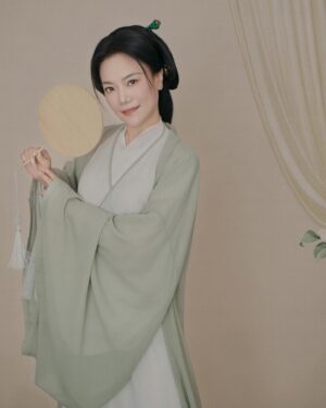 Shirley Chung Instagram - Recent trip back to Beijing, kept the tradition of a new set of studio pictures each time I go to Asia 🥰. 10 hours in the studio, I was transformed into characters from Kung Fu movies I grew up watching 💁🏻‍♀️. Green Hanfu from Han dynasty 💚 Orange and blue Hanfu from Ming dynasty 🧡💙 Jimmy wants to make a large print of #3 photo, and put it on @mschicafe ‘s wall 🫣 and I like #5 . Which one do you think is better for Ms Chi? 🤔🧐 #chefshirleychung #hanfu #hanfugirl #aapiheritagemonth #chineseamerican #mschi #studiophotography #wallart #beijinger