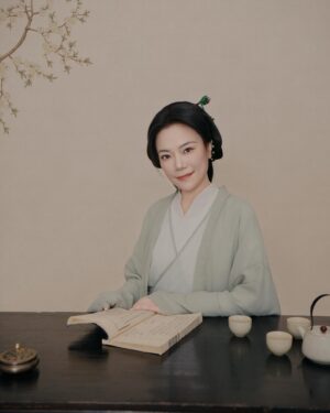Shirley Chung Instagram - Recent trip back to Beijing, kept the tradition of a new set of studio pictures each time I go to Asia 🥰. 10 hours in the studio, I was transformed into characters from Kung Fu movies I grew up watching 💁🏻‍♀️. Green Hanfu from Han dynasty 💚 Orange and blue Hanfu from Ming dynasty 🧡💙 Jimmy wants to make a large print of #3 photo, and put it on @mschicafe ‘s wall 🫣 and I like #5 . Which one do you think is better for Ms Chi? 🤔🧐 #chefshirleychung #hanfu #hanfugirl #aapiheritagemonth #chineseamerican #mschi #studiophotography #wallart #beijinger