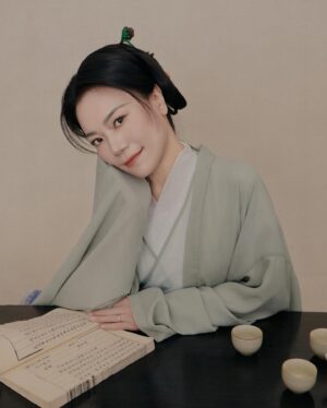 Shirley Chung Instagram - Recent trip back to Beijing, kept the tradition of a new set of studio pictures each time I go to Asia 🥰. 10 hours in the studio, I was transformed into characters from Kung Fu movies I grew up watching 💁🏻‍♀️. Green Hanfu from Han dynasty 💚 Orange and blue Hanfu from Ming dynasty 🧡💙 Jimmy wants to make a large print of #3 photo, and put it on @mschicafe ‘s wall 🫣 and I like #5 . Which one do you think is better for Ms Chi? 🤔🧐 #chefshirleychung #hanfu #hanfugirl #aapiheritagemonth #chineseamerican #mschi #studiophotography #wallart #beijinger