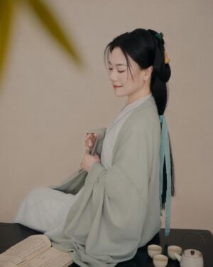Shirley Chung Instagram - Recent trip back to Beijing, kept the tradition of a new set of studio pictures each time I go to Asia 🥰. 10 hours in the studio, I was transformed into characters from Kung Fu movies I grew up watching 💁🏻‍♀️. Green Hanfu from Han dynasty 💚 Orange and blue Hanfu from Ming dynasty 🧡💙 Jimmy wants to make a large print of #3 photo, and put it on @mschicafe ‘s wall 🫣 and I like #5 . Which one do you think is better for Ms Chi? 🤔🧐 #chefshirleychung #hanfu #hanfugirl #aapiheritagemonth #chineseamerican #mschi #studiophotography #wallart #beijinger