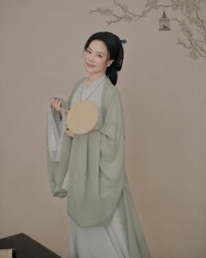 Shirley Chung Instagram - Recent trip back to Beijing, kept the tradition of a new set of studio pictures each time I go to Asia 🥰. 10 hours in the studio, I was transformed into characters from Kung Fu movies I grew up watching 💁🏻‍♀️. Green Hanfu from Han dynasty 💚 Orange and blue Hanfu from Ming dynasty 🧡💙 Jimmy wants to make a large print of #3 photo, and put it on @mschicafe ‘s wall 🫣 and I like #5 . Which one do you think is better for Ms Chi? 🤔🧐 #chefshirleychung #hanfu #hanfugirl #aapiheritagemonth #chineseamerican #mschi #studiophotography #wallart #beijinger