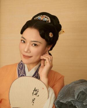 Shirley Chung Instagram - Recent trip back to Beijing, kept the tradition of a new set of studio pictures each time I go to Asia 🥰. 10 hours in the studio, I was transformed into characters from Kung Fu movies I grew up watching 💁🏻‍♀️. Green Hanfu from Han dynasty 💚 Orange and blue Hanfu from Ming dynasty 🧡💙 Jimmy wants to make a large print of #3 photo, and put it on @mschicafe ‘s wall 🫣 and I like #5 . Which one do you think is better for Ms Chi? 🤔🧐 #chefshirleychung #hanfu #hanfugirl #aapiheritagemonth #chineseamerican #mschi #studiophotography #wallart #beijinger