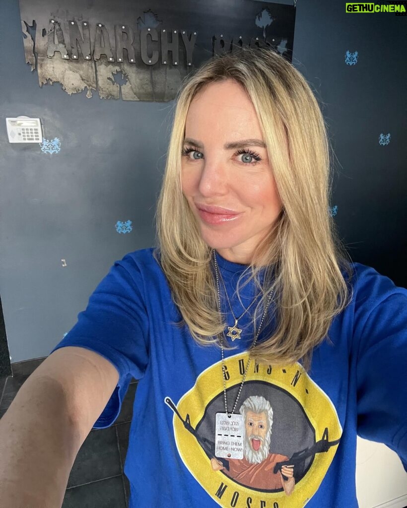 Shirly Brener Instagram - a special day post production with some awesome ppl!! - so exciting to see “Man In The Long Black Coat” @man_inthe_longblackcoat aka “Guns & Moses” come together!! so serendipitous that i actually had this t-shirt for almost 5 years!! pure Kismet😳🥹🇮🇱💙 cant wait for the world to see this important story about a Rabbi fighting antisemitism ( Mark Feauerstein) also starring the iconic Christopher Lloyd, Neil Mcdonough & Dermot Mulrony& to meet Mila’s @milabrenerofficial brave character & Juju’s @jujubrenerofficial sensitive character - his daughters Esty & Dini Zaltzman. Never felt this proud to be Jewish!! and what is special event to have both girls in this movie together!!! thank u amazing producer @leebroda for this genius casting and just for being an awesome rockstar luv u 🌟❤️ coming 2024!! 🎬🎬 •Bring Them Home Now necklace @ujafedny •jewelry @l_o_jewelry