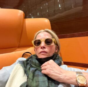 Sienna Guillory Instagram - Flight mode. My selfie arm isn’t long enough to show my entire WHSmith tracksuit with matching flip flops but it’s reassuring to know, as I glance around the posh bits of the plane, that everyone else here only wears clothes with the names of the airport shops all over them too. 

#branding #balencigara #giucci #Frendzi #bighermescouchonaplane
