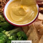 Sohla El-Waylly Instagram - Vegan Queso (aka Nooch Dip!) For all! 2 tbsp evoo & 4 chopped garlic cloves—sweat 1 tsp smoked paprika—sizzle Add 3 cups water, 1 cup cashews, 1/3 cup nooch, 1 tsp mustard powder, 1 small sweet potato diced, 1 chipotle pepper, 1 tbsp adobo (from the chipotle can), pinch msg—simmer until TOTALLY tender Blend until smooth and season with LOTS of salt From pg 223 of my book (but with more nooch cause I felt like it) Do you nooch?