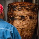 Sohla El-Waylly Instagram - Learn about the evolution of the al pastor taco in the latest episode of DEEP DISH, our limited run podcast miniseries in collaboration with the @thesporkful ! There are lies. There is betrayal. There’s pineapple. If you can’t find a trompo near you, try this recipe (adapted from @alexstupak ) for pork tacos with a hint of pastor: for adobo: 8 ancho chiles 8 guajillo chiles 1 chipotle morita chile 1 2-inch stick of Mexican cinnamon 1 tbsp achiote seeds or 1 cube achiote paste 1 tsp black peppercorns 1 tsp Mexican oregano 1/4 tsp cumin seeds 3 cloves 20 garlic cloves, skin on 1 cup apple cider vinegar for tacos: oil for the grill 1 cup adobo Four 1⁄2-inch-thick boneless pork shoulder steaks Kosher salt 12 corn or flour tortillas, warm 1⁄4 ripe pineapple, peeled, cored, and cut into 24 even slices 1⁄2 medium white onion, minced 1 bunch cilantro, roughly chopped 2 limes, cut into wedges Salsa for serving Make the adobo: Remove the stems from the chiles and tear open. Shake out and discard the seeds. Tear into small pieces.…..