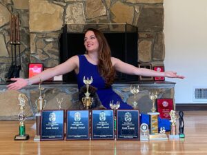 Sona Movsesian Instagram - If you watched the Instagram video posted on the @teamcoco page today then you know these are photos of me with my speech trophies from college. If you didn’t watch the video, then some background: I did a photo shoot with my old speech trophies from college. And I’m giving them away! Info is on the Twitters.
