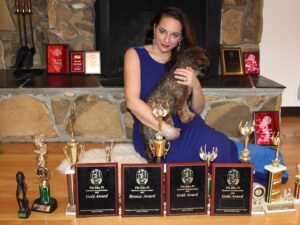 Sona Movsesian Instagram - If you watched the Instagram video posted on the @teamcoco page today then you know these are photos of me with my speech trophies from college. If you didn’t watch the video, then some background: I did a photo shoot with my old speech trophies from college. And I’m giving them away! Info is on the Twitters.
